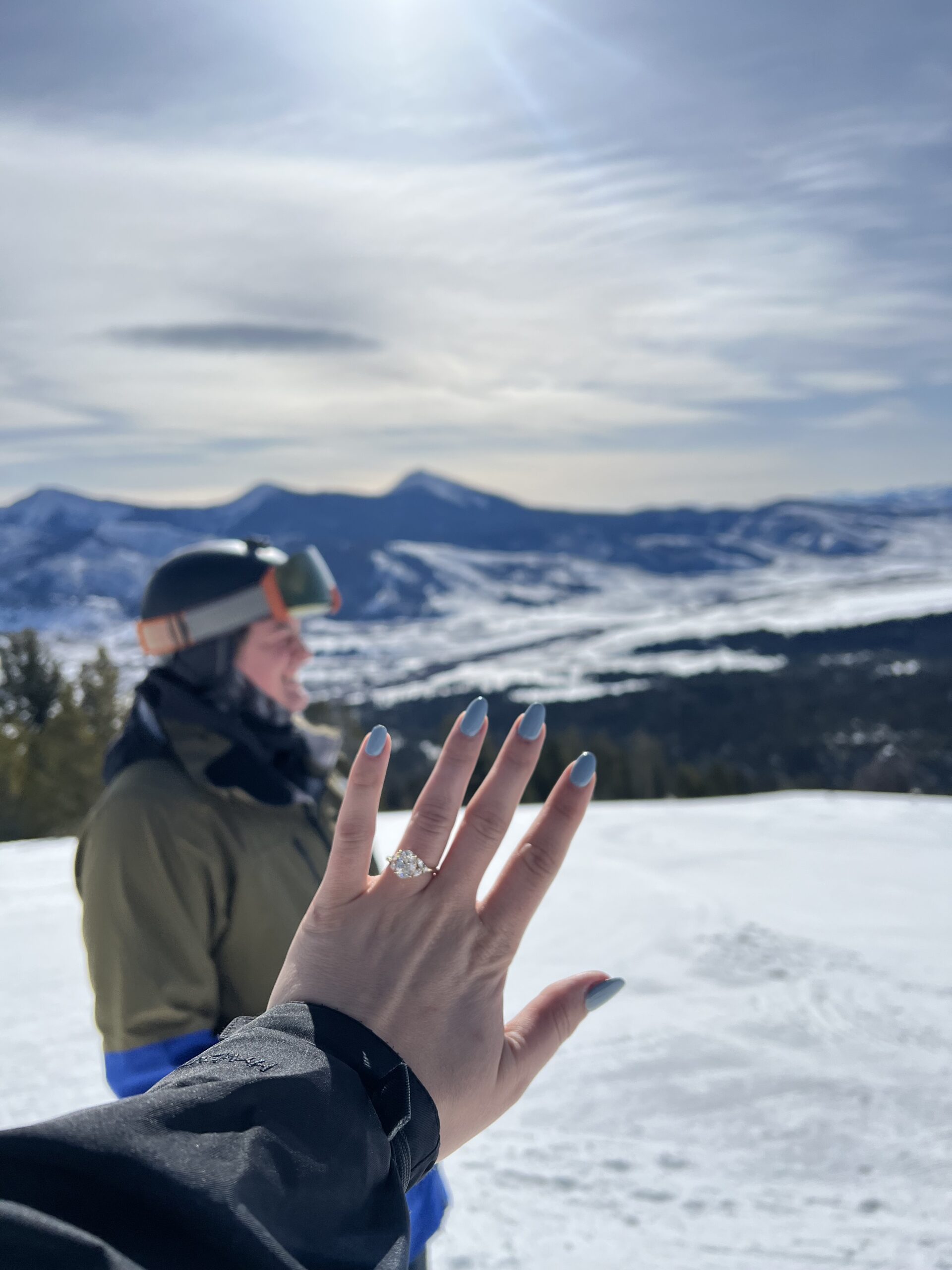 Winter skiing engagement photo