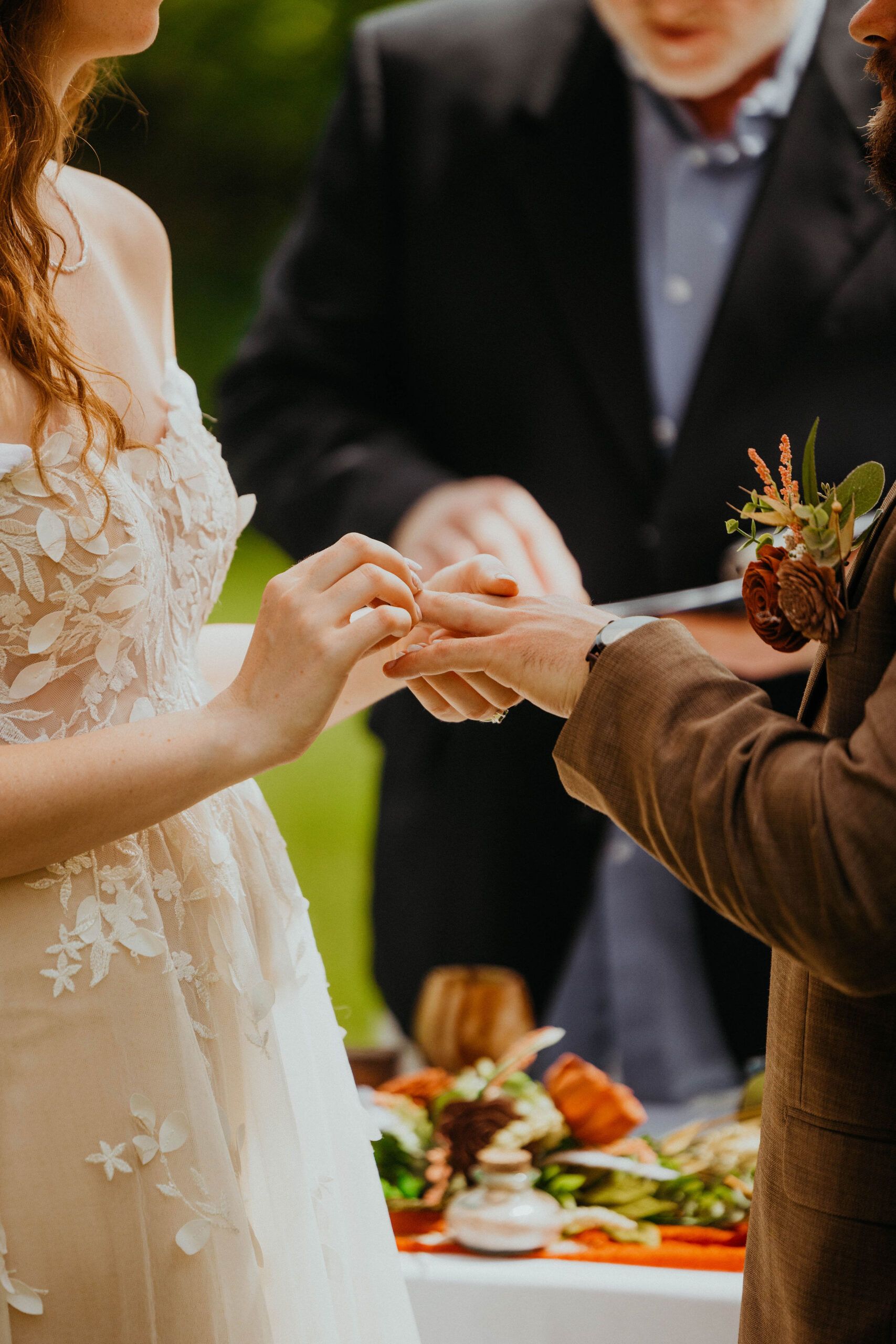 Bride and Groom Exchanging Rings