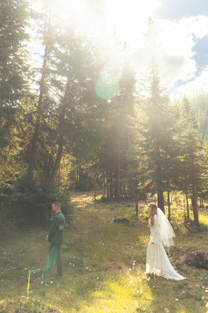 Bride and Groom first look in the woods